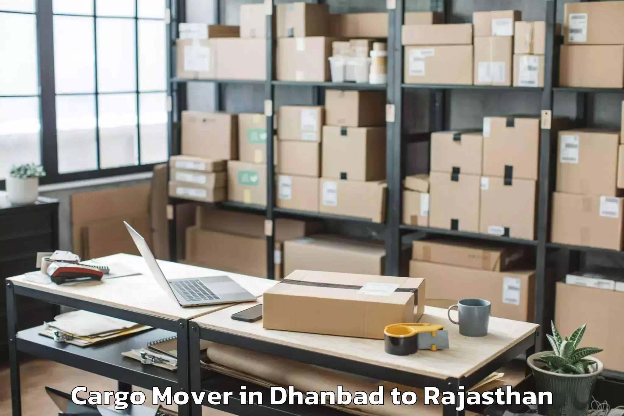 Easy Dhanbad to Bagar Cargo Mover Booking